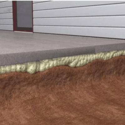 Illustration of polyurethane foam injection beneath a concrete slab, fill voids and lift the uneven basement floor in Fairfax, VA.