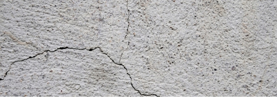 hairline foundation crack on a basement wall — thin non-structural crack in Northern Virginia