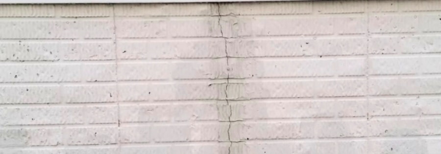 vertical foundation crack running top to bottom on a concrete wall in Northern Virginia