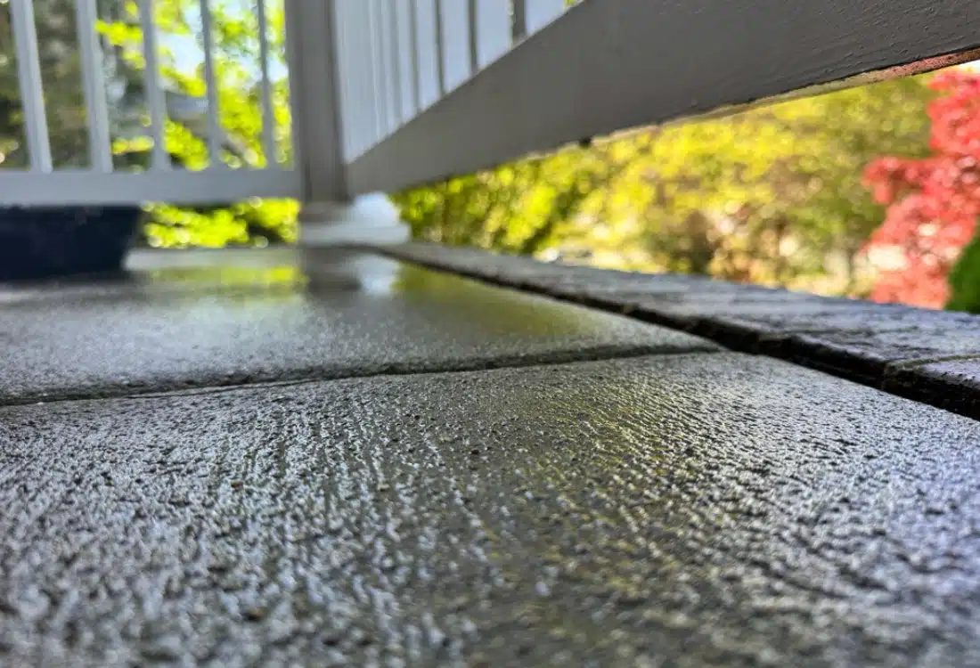 Leveled front porch concrete slab and gap sealed after polyurethane foam lifting in Fredericksburg, VA.