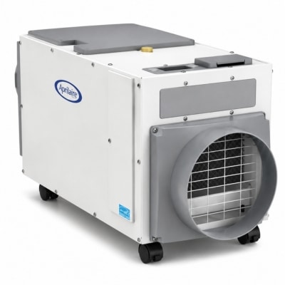 Aprilaire basement dehumidifier unit pulling moist air and reducing humidity to eliminate musty smell in Manassas, VA.