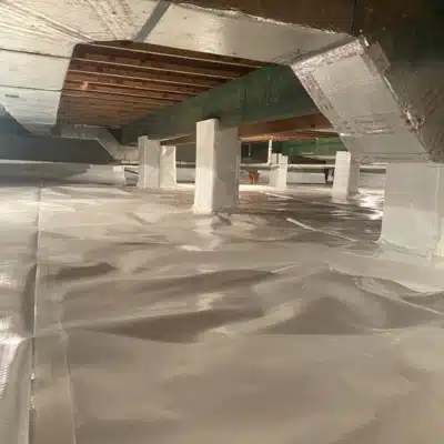 Encapsulation crawl space to seal out ground moisture and humidity and fix wet crawl space insulation in Charles Town, WV.