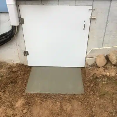 Installed crawl space door to seal out humid outdoor air fix wet crawl space insulation in Bristow, VA