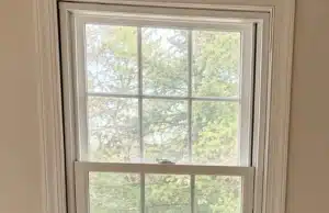 Window frame with uneven gaps on both sides from foundation movement, a sign of sticking windows in Stephens City, VA