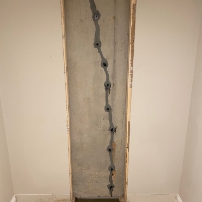 Completed basement crack repair to stop moisture, a solution for basement wood rotting treatment in White Post, VA.