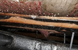 Condensation on crawl space pipes showing failed thermal barrier causing energy loss, sign of high electric bills in Harpers Ferry, WV.