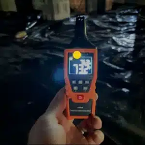Moisture meter showing high crawl space humidity causing damp space and asthma or allergy symptoms in Southbridge, VA.