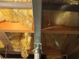 20-foot steel beam installed beneath sagging floor in White Post, VA, to redistribute weight and correct floor deflection.